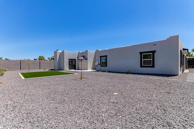 13012 N 36th Dr, Phoenix, AZ 85029 - rear view of property with stucco siding