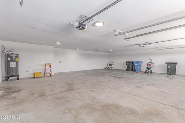 13012 N 36th Dr, Phoenix, AZ 85029 - garage with electric water heater and a garage door opener