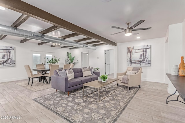 13012 N 36th Dr, Phoenix, AZ 85029 - living room featuring light wood-type flooring, beam ceiling, and ceiling fan