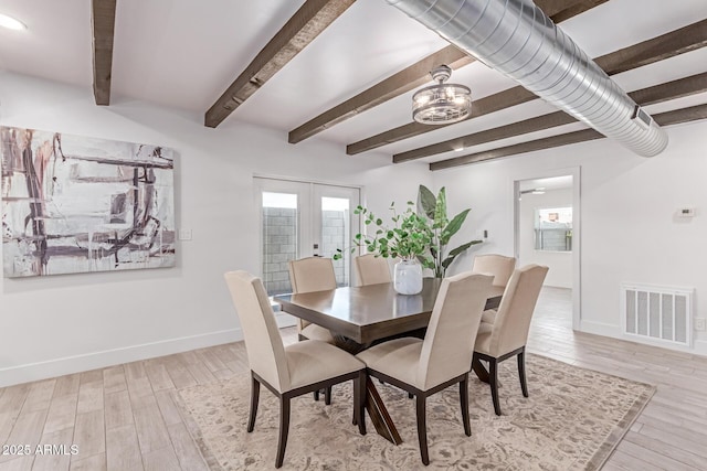 13012 N 36th Dr, Phoenix, AZ 85029 - dining space featuring light wood finished floors, beamed ceiling, french doors, and a chandelier