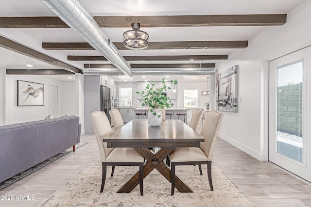 13012 N 36th Dr, Phoenix, AZ 85029 - dining space with beam ceiling and light wood-type flooring