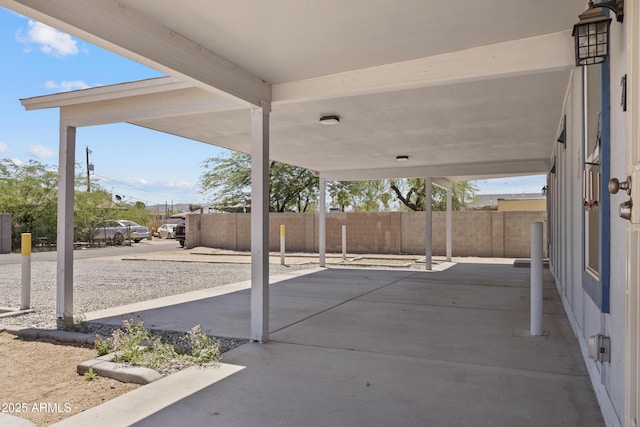 4410 S 12th Dr Unit 1-2, Phoenix, AZ 85041 - view of patio / terrace with a carport and driveway