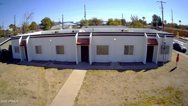 view of front of home with stucco siding