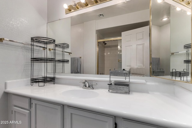 10101 N Arabian Trl Unit 2018, Scottsdale, AZ 85258 - bathroom featuring vanity and a stall shower