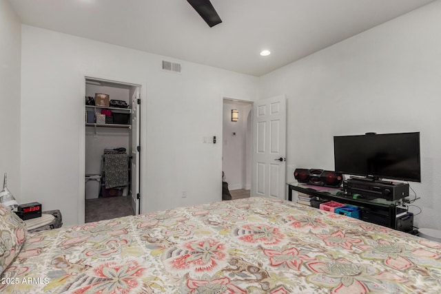 10101 N Arabian Trl Unit 2018, Scottsdale, AZ 85258 - bedroom featuring recessed lighting, ceiling fan, a walk in closet, and a closet