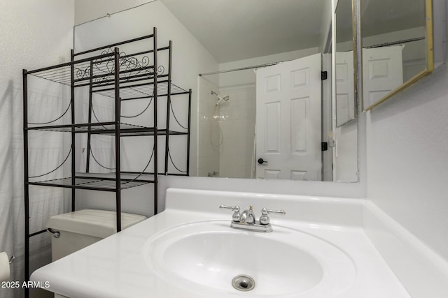 10101 N Arabian Trl Unit 2018, Scottsdale, AZ 85258 - bathroom with a shower, toilet, and vanity