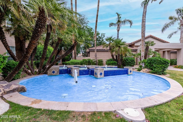 10101 N Arabian Trl Unit 2018, Scottsdale, AZ 85258 - view of swimming pool featuring a pool with connected hot tub