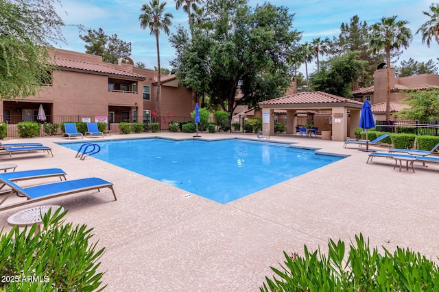 10101 N Arabian Trl Unit 2018, Scottsdale, AZ 85258 - community pool with fence and a patio area