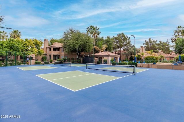 10101 N Arabian Trl Unit 2018, Scottsdale, AZ 85258 - view of tennis court with fence and a gazebo