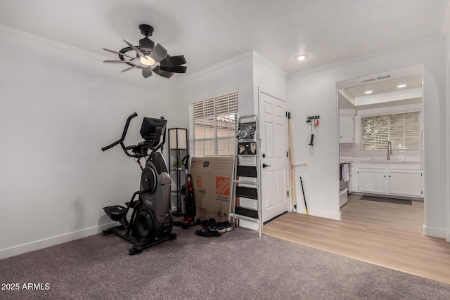 10101 N Arabian Trl Unit 2018, Scottsdale, AZ 85258 - workout area featuring ornamental molding, recessed lighting, a ceiling fan, a sink, and baseboards