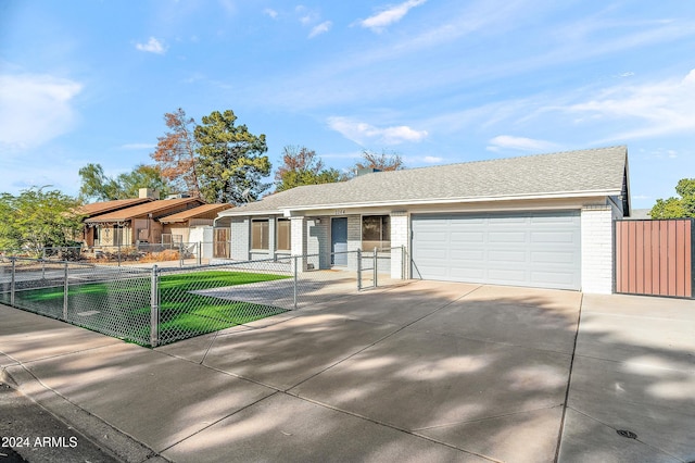 ranch-style house with a front lawn