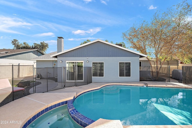 view of swimming pool with a patio