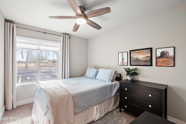 bedroom with ceiling fan and carpet floors