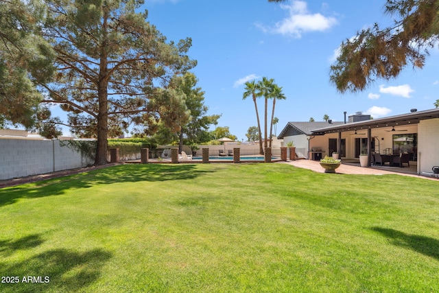401 E Braeburn Dr, Phoenix, AZ 85022 - view of yard with ceiling fan and a patio