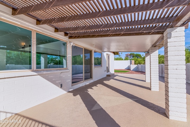 view of patio with fence and a pergola