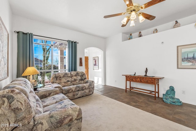 carpeted living room featuring ceiling fan