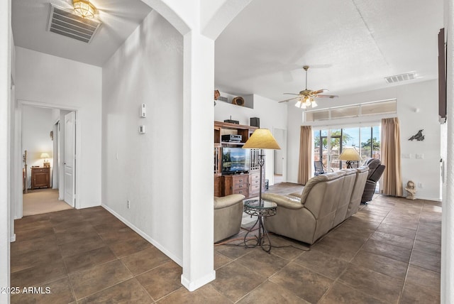 living room with ceiling fan