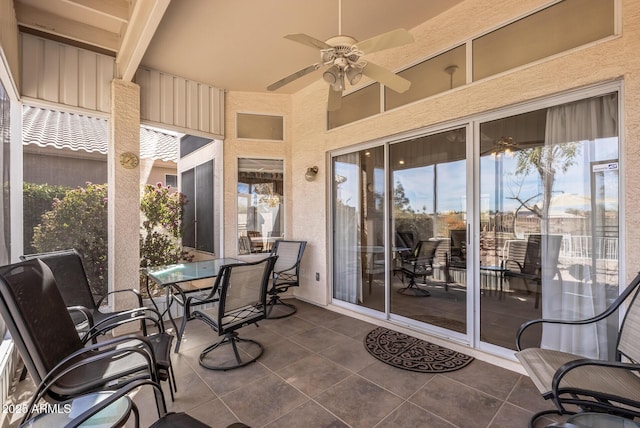 view of patio featuring ceiling fan