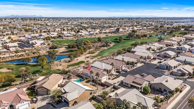 bird's eye view with a water and mountain view