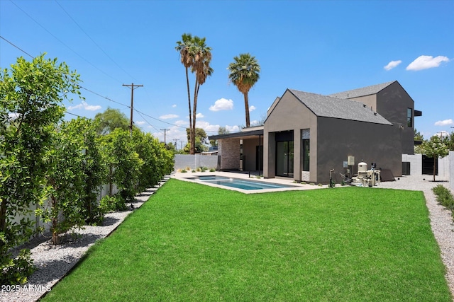 4445 E Roma Ave, Phoenix, AZ 85018 - rear view of house with stucco siding, a pool with connected hot tub, and a patio