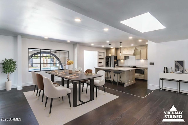 3646 W Brown St, Phoenix, AZ 85051 - dining area with dark wood-style floors, recessed lighting, baseboards, and a skylight