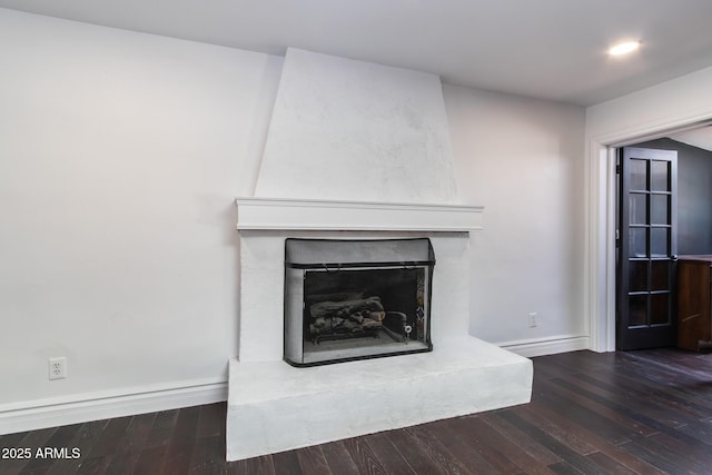 3646 W Brown St, Phoenix, AZ 85051 - detailed view of baseboards, a large fireplace, and wood finished floors