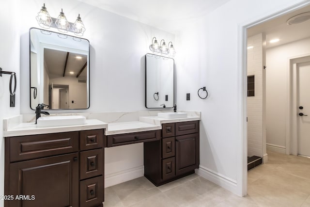 3646 W Brown St, Phoenix, AZ 85051 - bathroom with double vanity, tile patterned flooring, and baseboards