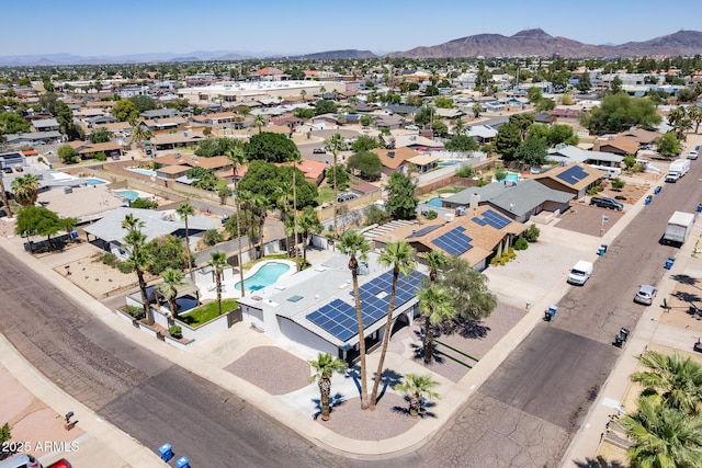 3646 W Brown St, Phoenix, AZ 85051 - aerial perspective of suburban area with a mountainous background and a pool area