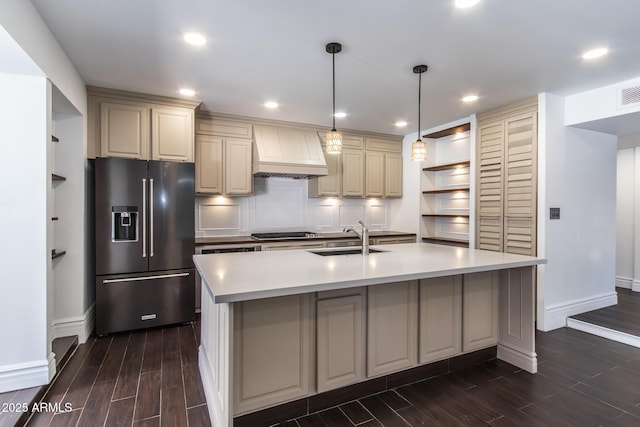 3646 W Brown St, Phoenix, AZ 85051 - kitchen with high end refrigerator, a sink, premium range hood, baseboards, and recessed lighting