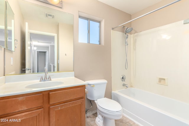 full bathroom with  shower combination, vanity, and toilet