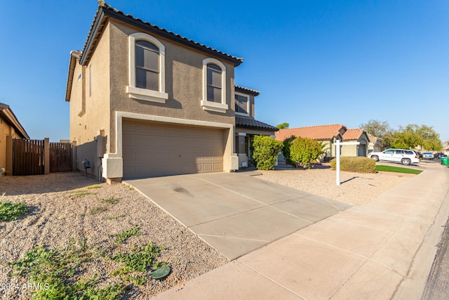 view of front of property featuring a garage