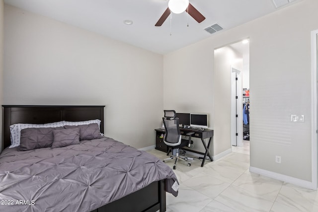 bedroom with ceiling fan and light tile flooring