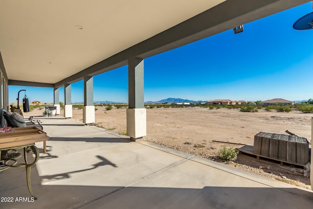 view of patio featuring a mountain view