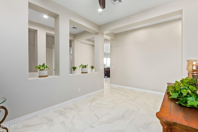 spare room featuring light tile floors