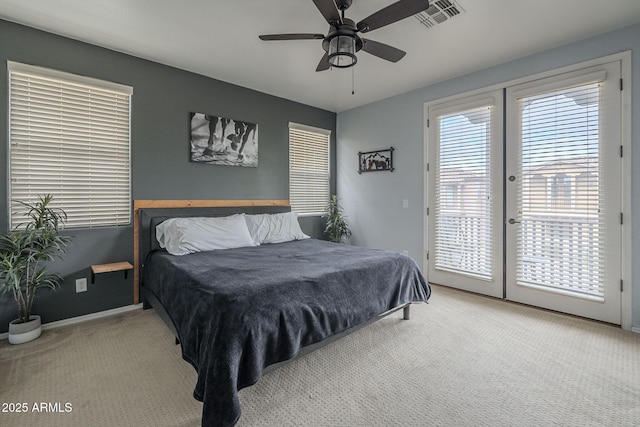 carpeted bedroom with visible vents, baseboards, a ceiling fan, access to outside, and french doors