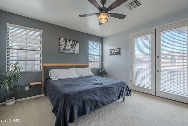 bedroom with carpet, french doors, visible vents, a ceiling fan, and access to outside