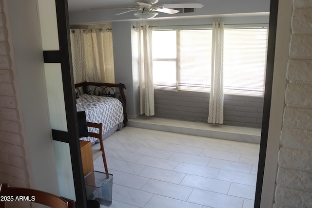 bedroom featuring ceiling fan