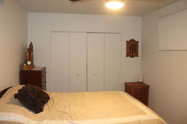 bedroom with visible vents, a closet, and ceiling fan