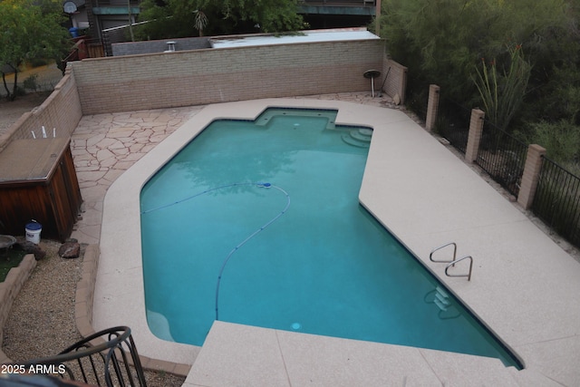 view of pool featuring a fenced backyard and a fenced in pool