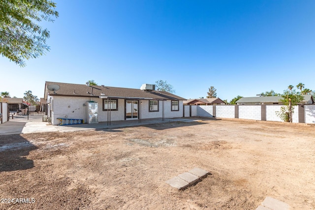 view of front of house featuring a patio and central air condition unit