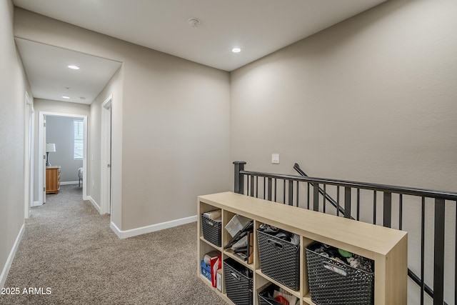 hallway featuring carpet flooring