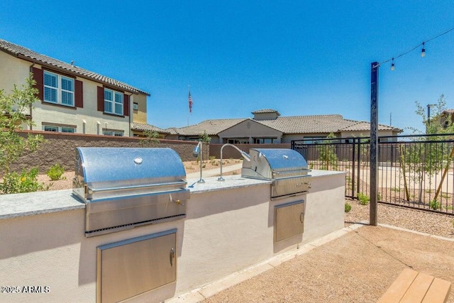 view of patio with a grill and area for grilling