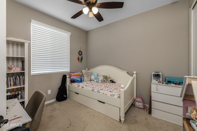 carpeted bedroom with ceiling fan