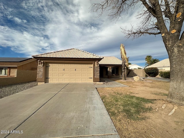 view of front of property featuring a garage