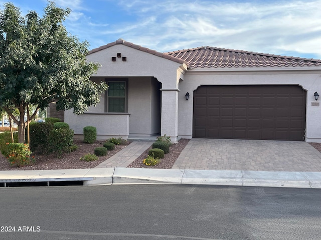 view of front of house with a garage