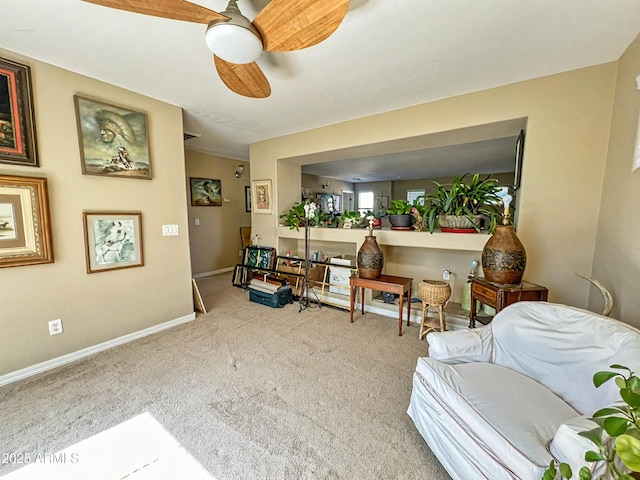 4939 W Harwell Rd, Laveen, AZ 85339 - sitting room with carpet, a ceiling fan, and baseboards