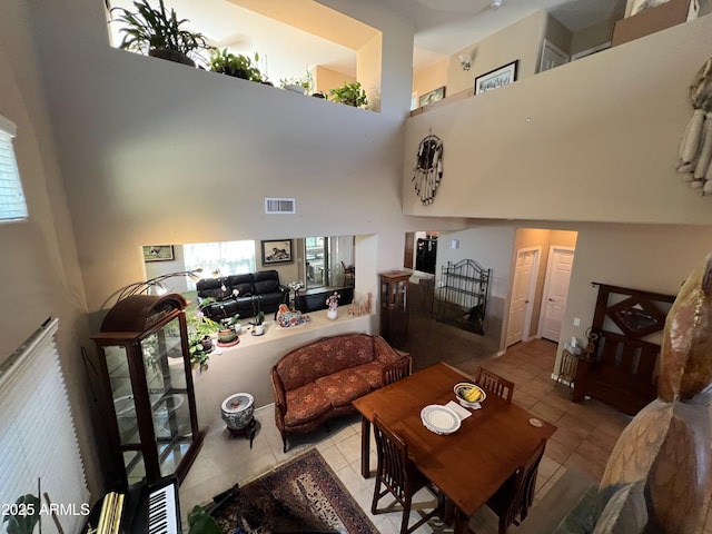 4939 W Harwell Rd, Laveen, AZ 85339 - interior space featuring a towering ceiling and visible vents