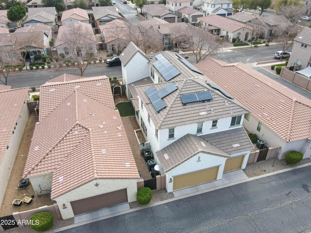 birds eye view of property with a residential view