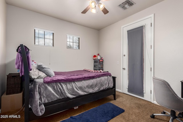 bedroom featuring ceiling fan, visible vents, and carpet flooring