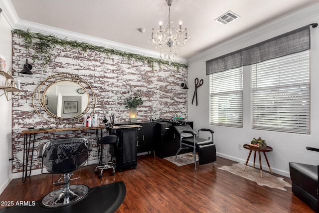 home office featuring visible vents, ornamental molding, wood finished floors, a chandelier, and baseboards